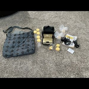 Medela pump in style a/c adapter and car adapter